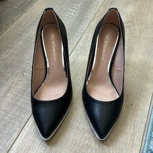 Classic black heels with silver accents